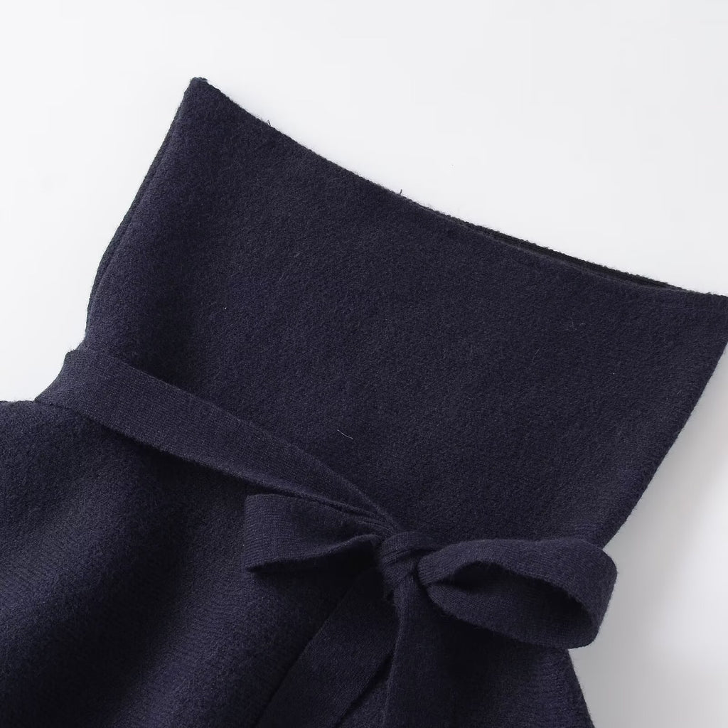 Short skirt style knitted bow top with hem