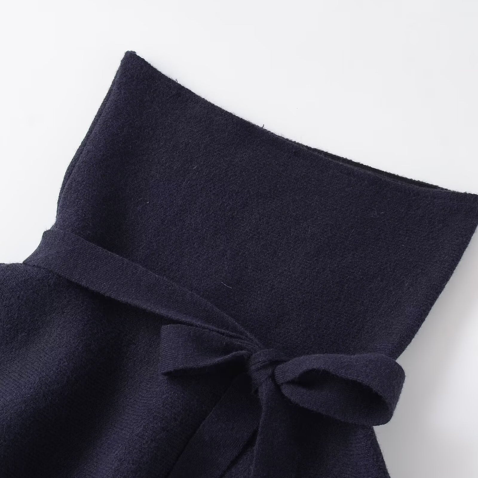 Short skirt style knitted bow top with hem